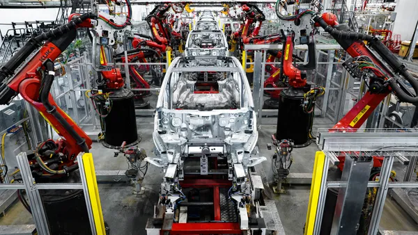 Model Y bodies on the assembly line at Tesla's Gigafactory in Texas.