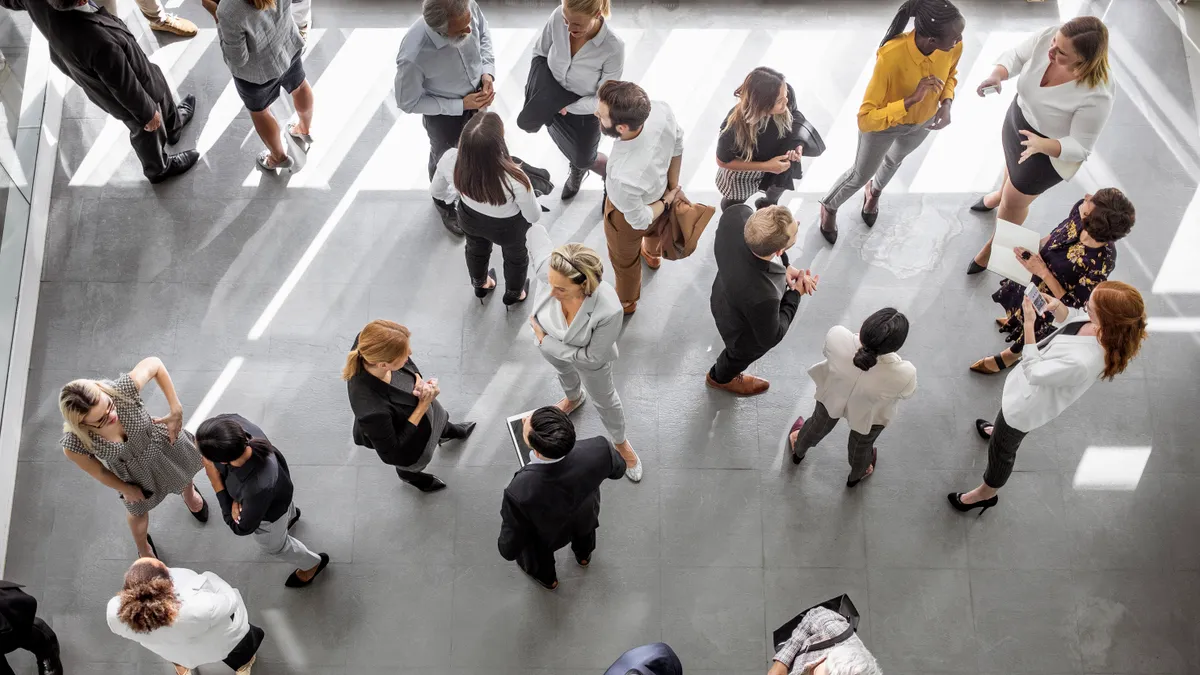 People speaking during a conference event.