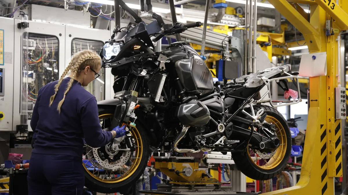 The trainee works on an electric-powered bike.