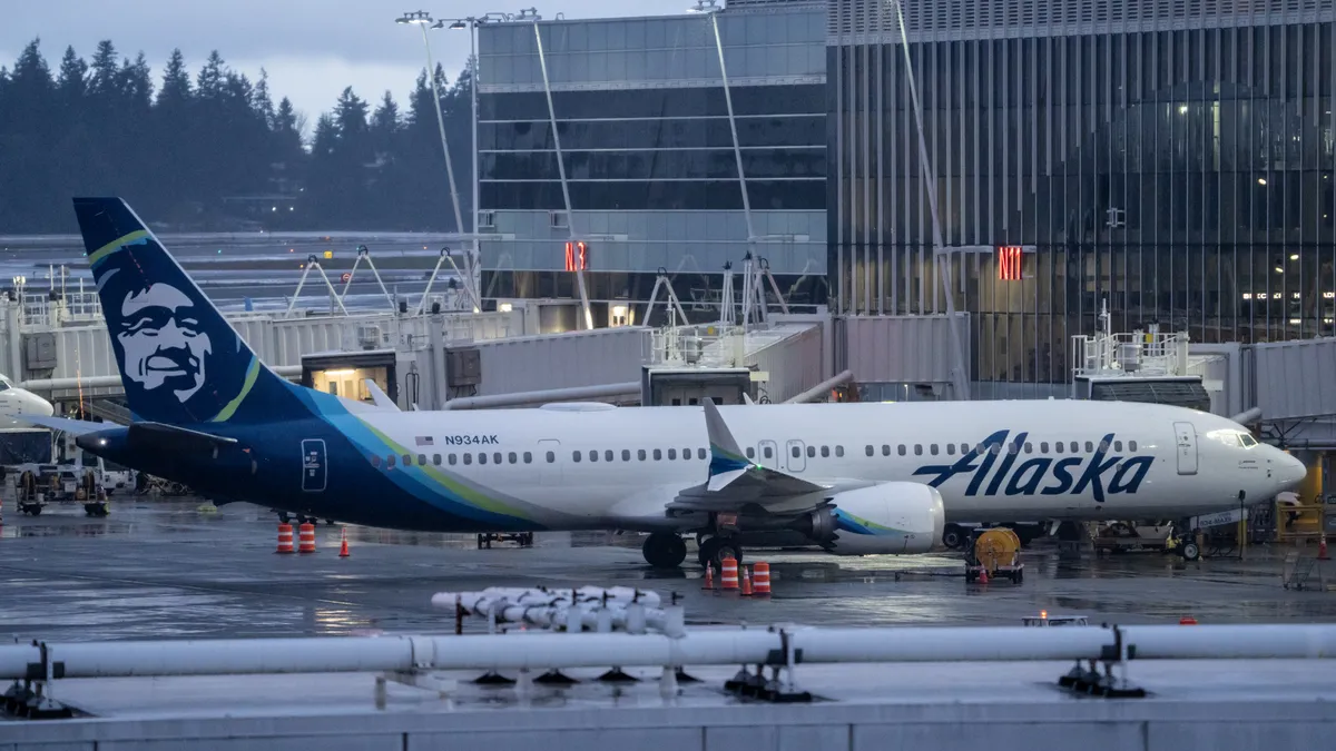 An Alaska Airlines Boeing 737 MAX 9 plane sits at a gate at Seattle-Tacoma International Airport on January 6, 2024